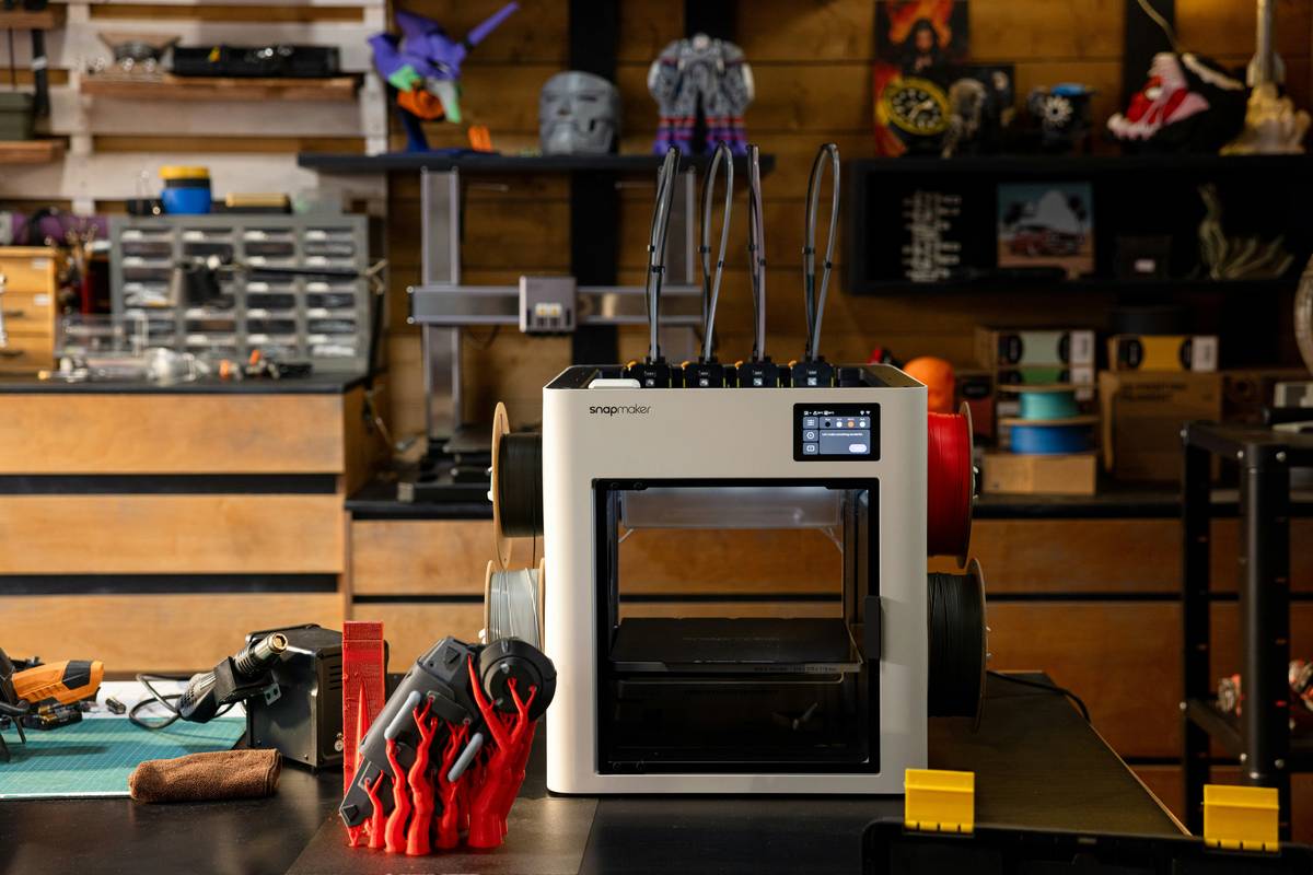 3d printing prototyping service creating a detailed ceramic-style vase prototype on a print bed
